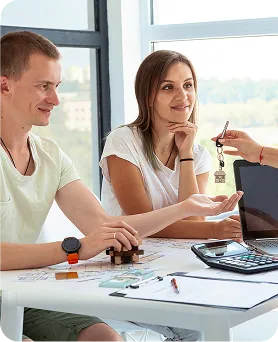 Couple receiving keys after mortgage approval